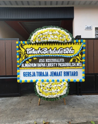 Papan Bunga Duka di Koroptak